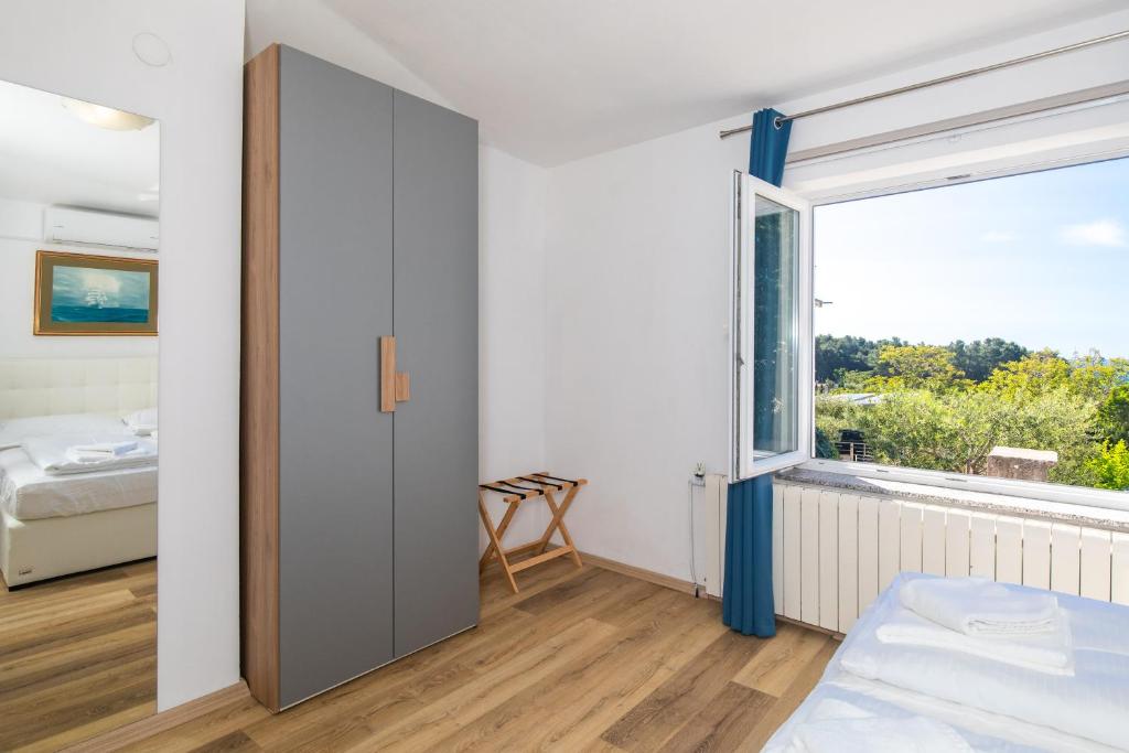 Postel nebo postele na pokoji v ubytování Apartments Soul