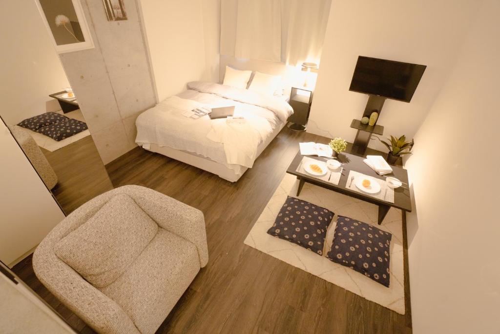 Postel nebo postele na pokoji v ubytování FL Residence Seeikokan III