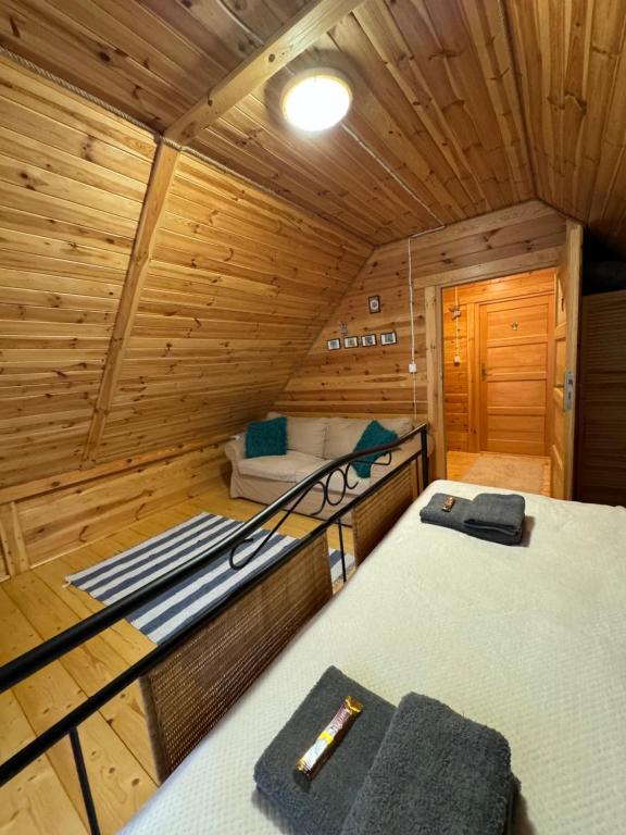 Posteľ alebo postele v izbe v ubytovaní Domek Borsk