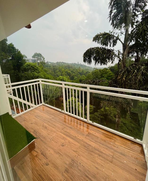 Balkón nebo terasa v ubytování HOTEL WHITE HOUSE, Munnar