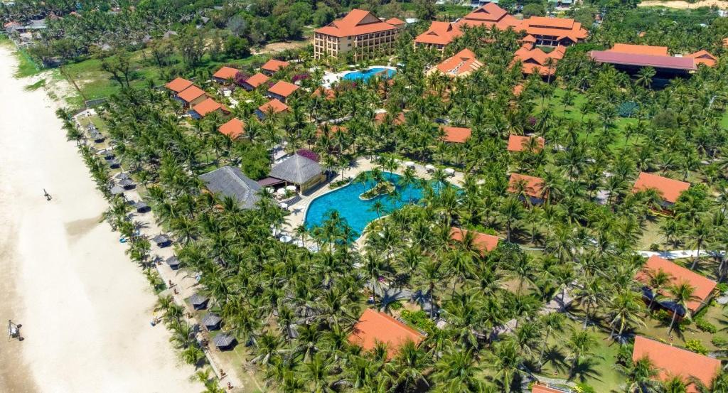 an aerial view of a resort with a pool and a beach at Pandanus Resort in Mui Ne