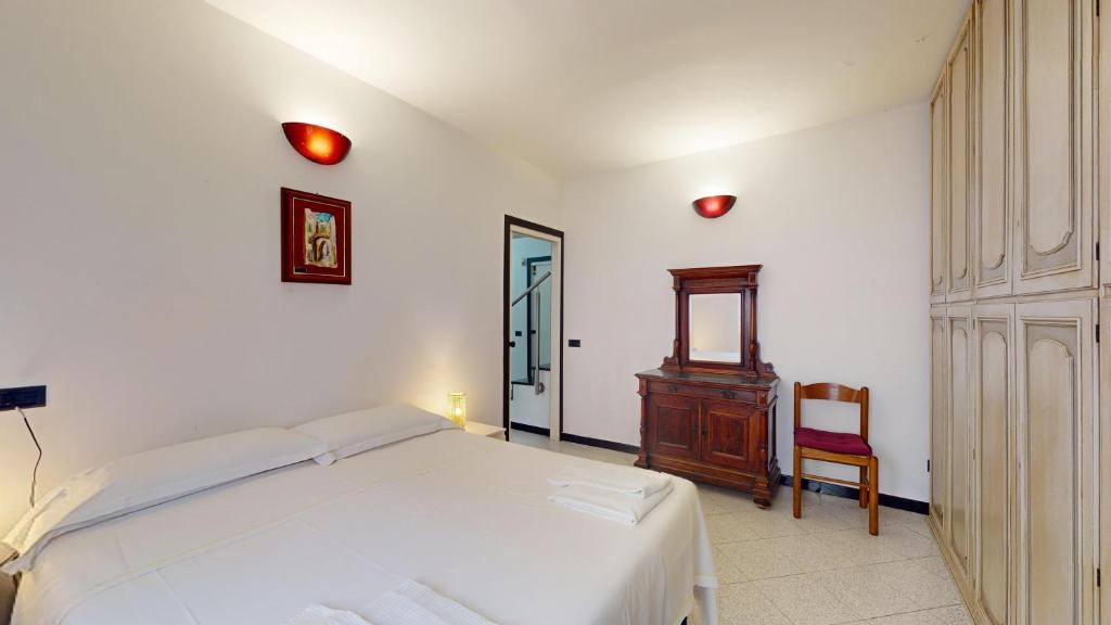 Posteľ alebo postele v izbe v ubytovaní Casa Anna - By Ligooria