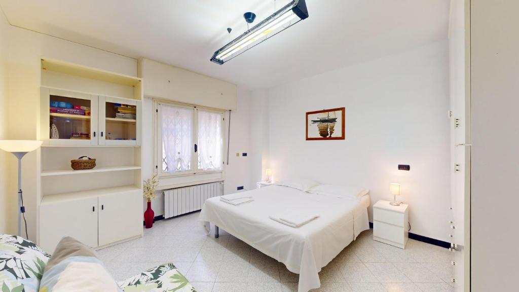 Posteľ alebo postele v izbe v ubytovaní Casa Anna - By Ligooria