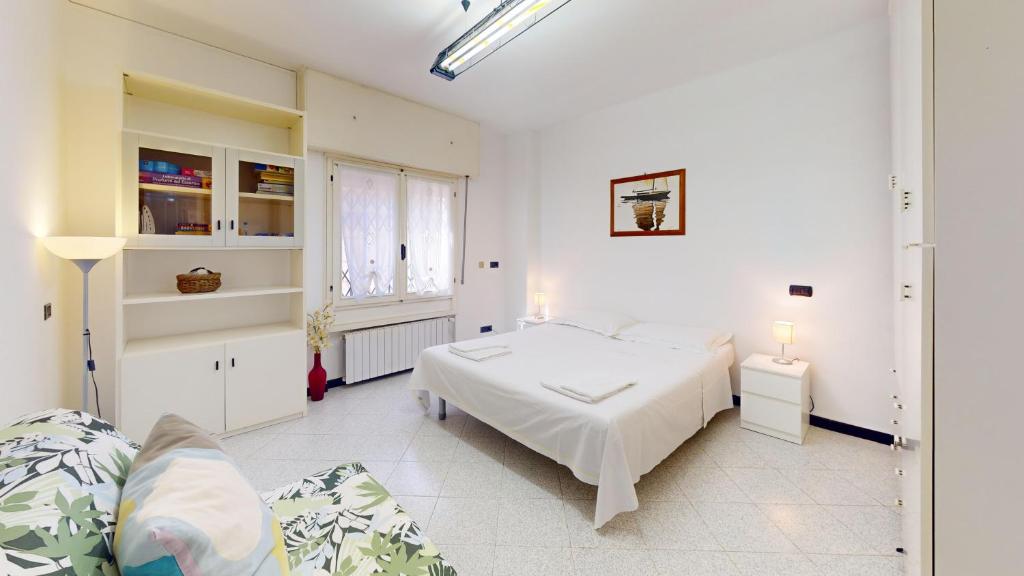 Posteľ alebo postele v izbe v ubytovaní Casa Anna - By Ligooria