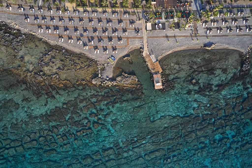 an aerial view of a bridge over a body of water at Aquagrand Exclusive Deluxe Resort Lindos - Adults only in Lindos