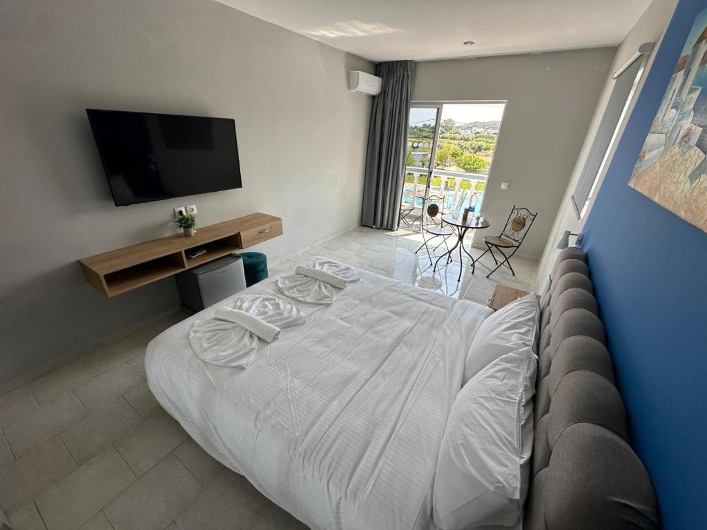 Postel nebo postele na pokoji v ubytování Ayit Hotel