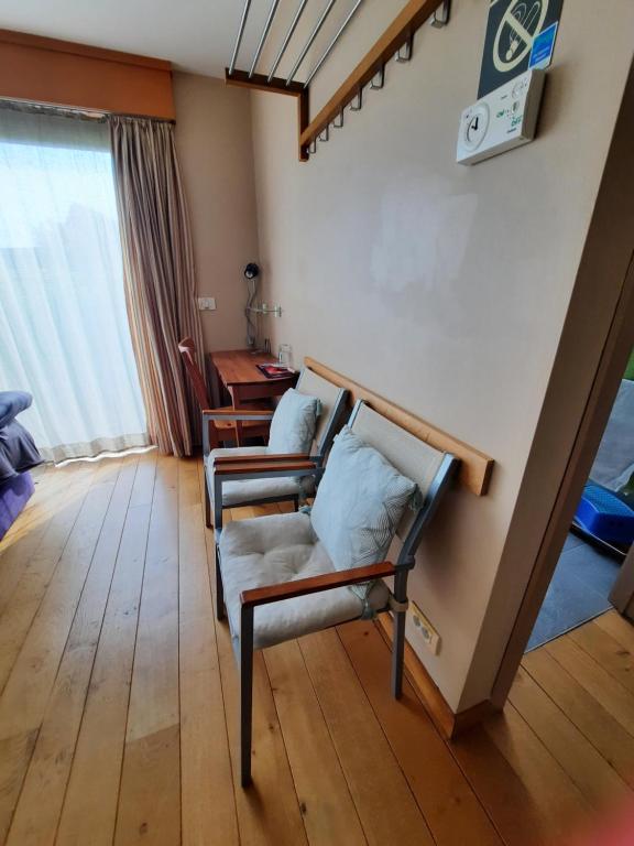 Posezení v ubytování B&B Lomolen