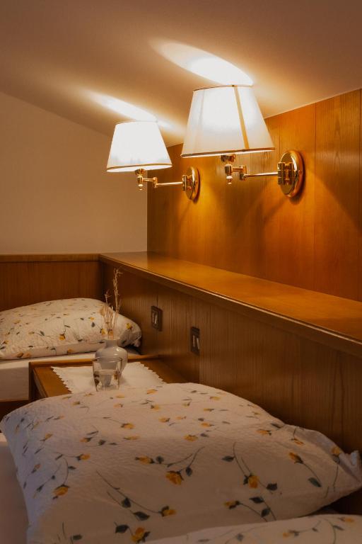 Postel nebo postele na pokoji v ubytování Pension Lafod