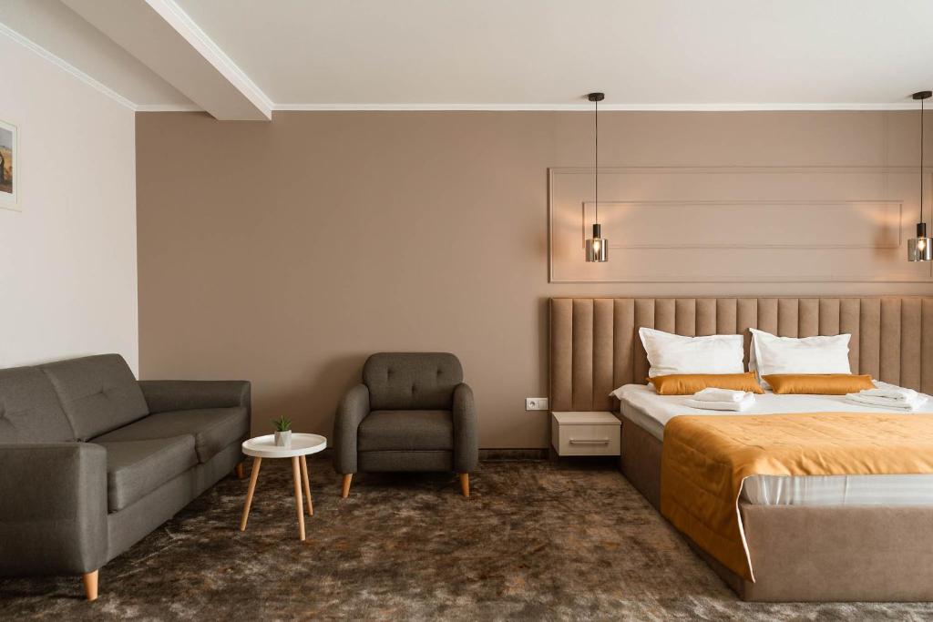 Postel nebo postele na pokoji v ubytování ALLEGRIA HOTEL Spa