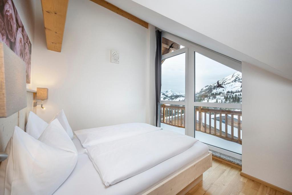 Postel nebo postele na pokoji v ubytování Appartement Haus Faßwald