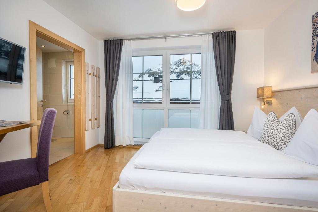 Postel nebo postele na pokoji v ubytování Appartement Haus Faßwald