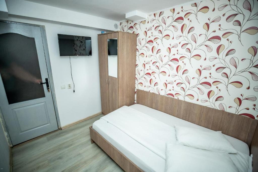 Postel nebo postele na pokoji v ubytování Nelana