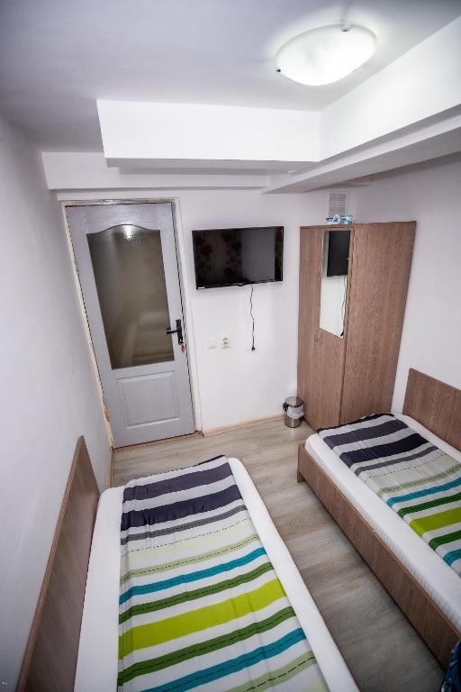 Postel nebo postele na pokoji v ubytování Nelana