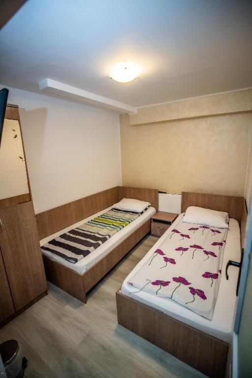 Postel nebo postele na pokoji v ubytování Nelana