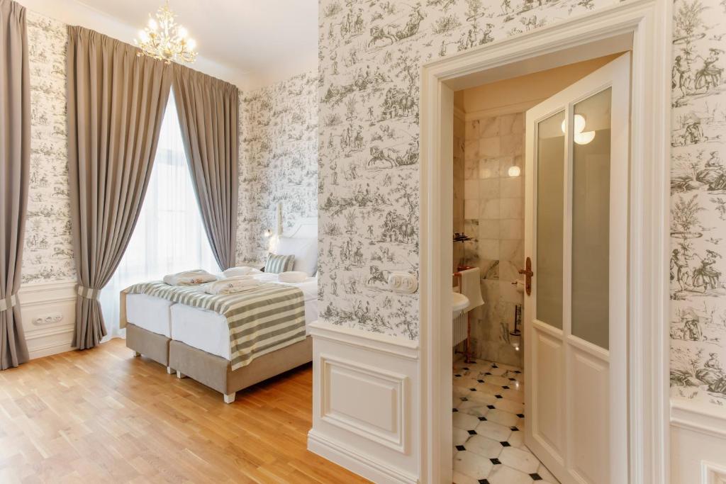 Postel nebo postele na pokoji v ubytování GOYA Vitality Hotel
