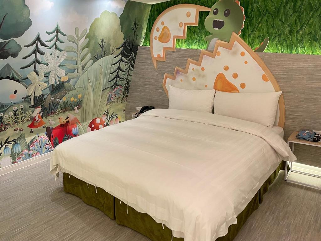 Postel nebo postele na pokoji v ubytování Ya Nold Hot Spring Hotel