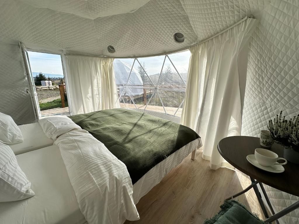 Postel nebo postele na pokoji v ubytování Glamping 4 us
