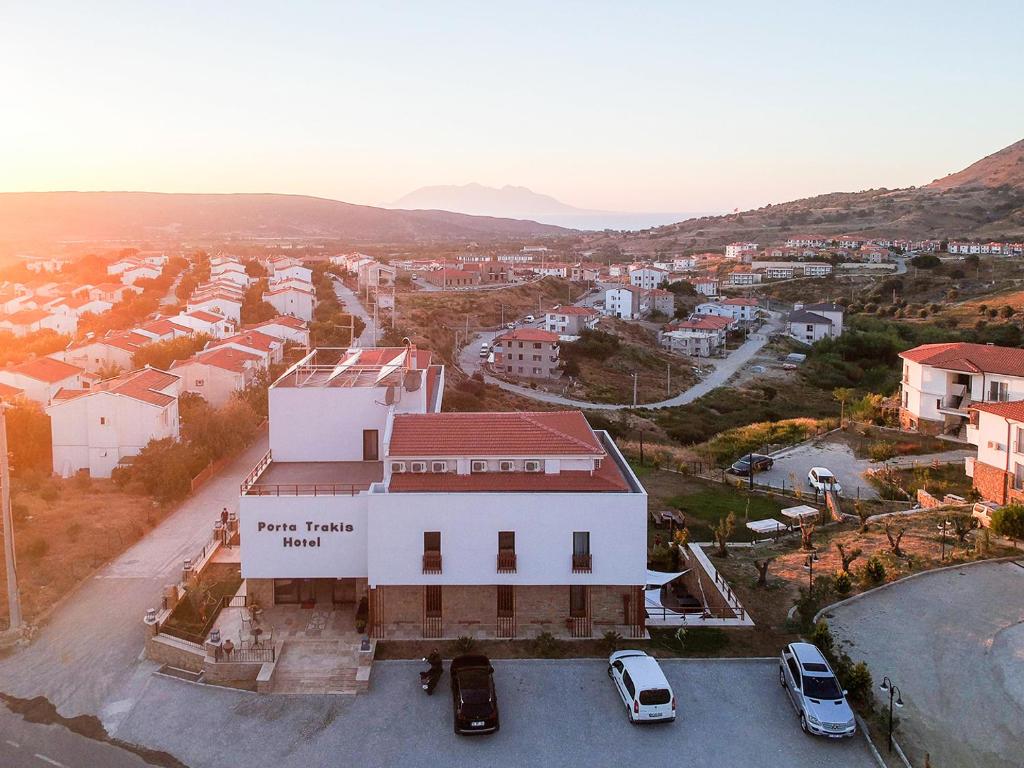 an aerial view of a town with a white building at Porta Trakis HOTEL in Bademli
