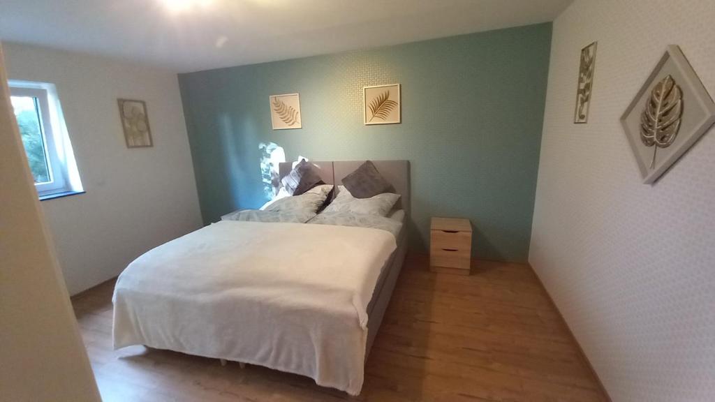 Postel nebo postele na pokoji v ubytování Ferienwohnung Leonie