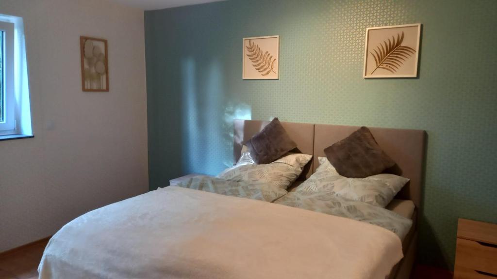 Postel nebo postele na pokoji v ubytování Ferienwohnung Leonie