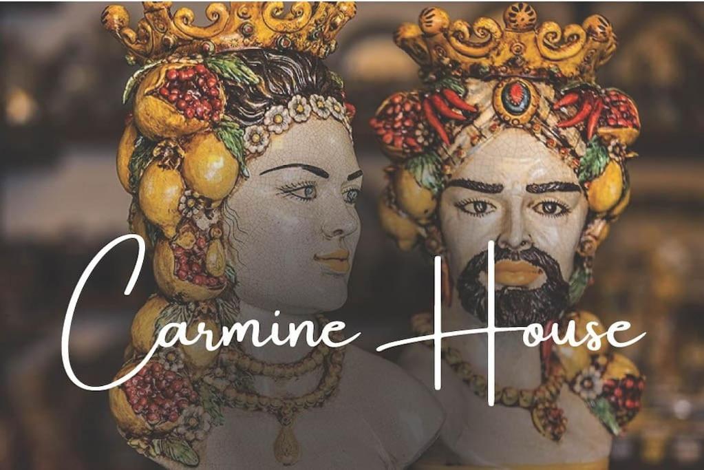 a picture of a man and a woman wearing crowns at Carmine House in Monreale