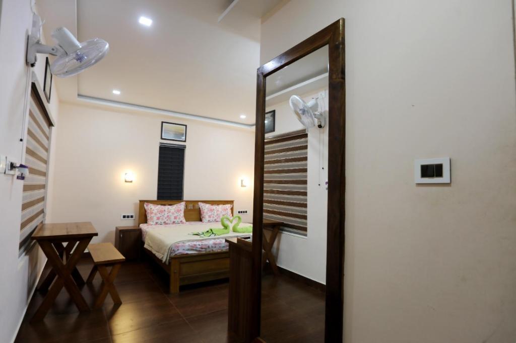 Postelja oz. postelje v sobi nastanitve Agronest Farm & Resort By Teal Luxury Stay
