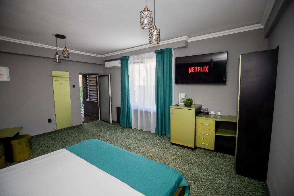 Postel nebo postele na pokoji v ubytování Nelana