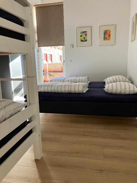 Postel nebo postele na pokoji v ubytování Randbøldal Camping & Cabins