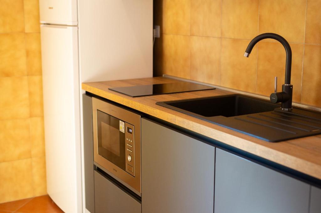 Kuchnia lub aneks kuchenny w obiekcie Apartman Sokolovski