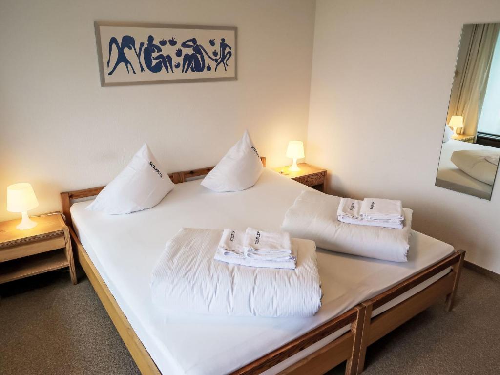 Postel nebo postele na pokoji v ubytování Apartment Apt B 022 by Interhome