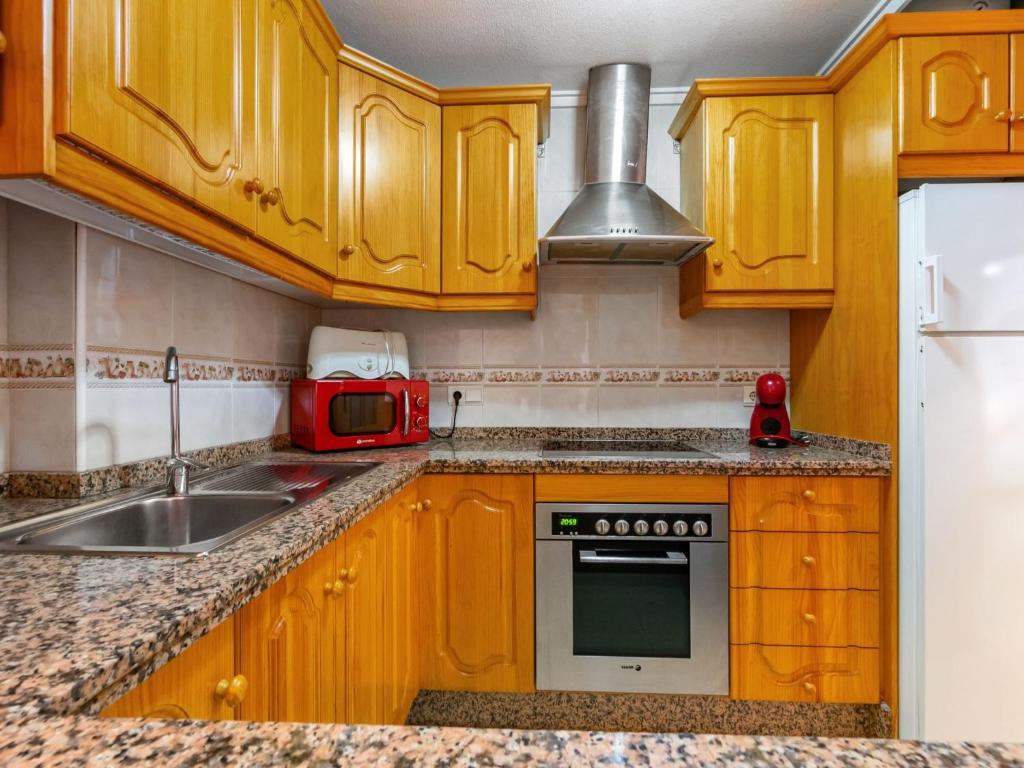 A kitchen or kitchenette at Apartment Edificio Las Americas by Interhome