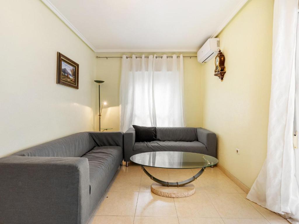 A seating area at Apartment Edificio Las Americas by Interhome