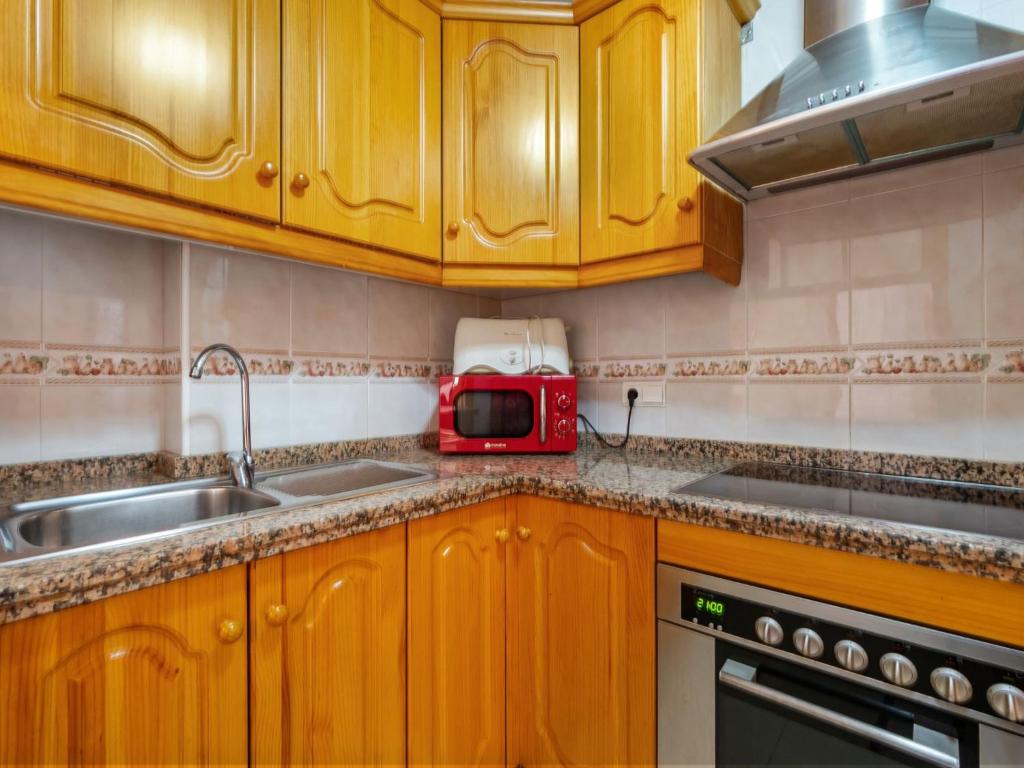 A kitchen or kitchenette at Apartment Edificio Las Americas by Interhome