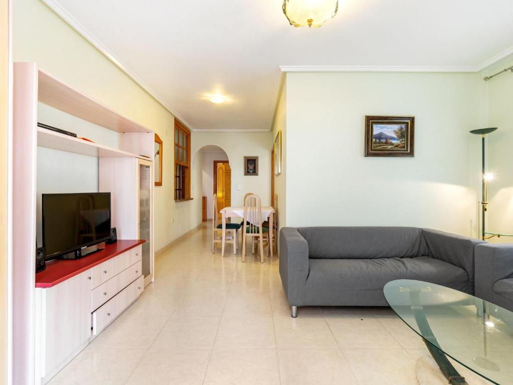 A television and/or entertainment centre at Apartment Edificio Las Americas by Interhome