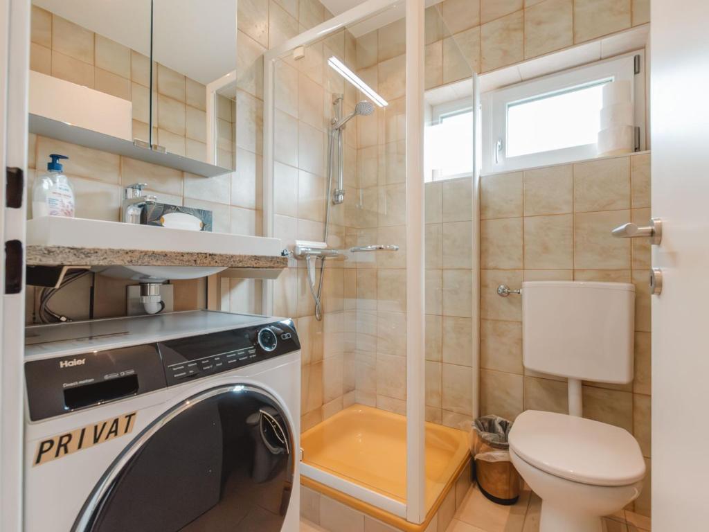 A bathroom at Apartment Holger by Interhome