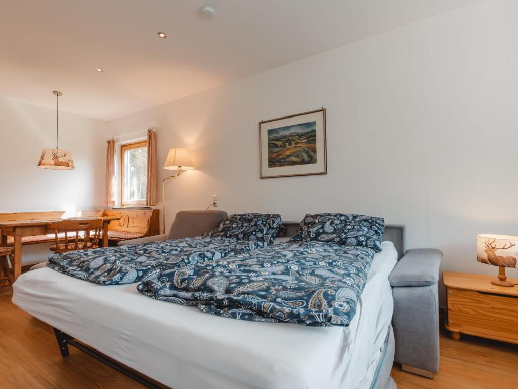 A bed or beds in a room at Apartment Holger by Interhome