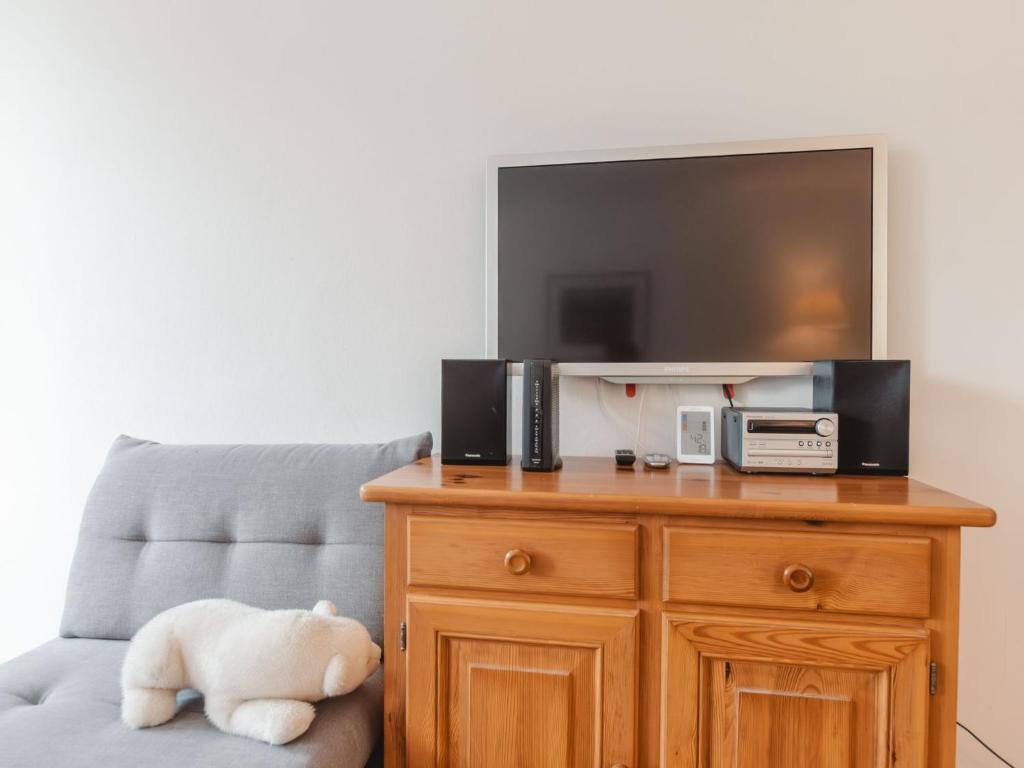 A television and/or entertainment centre at Apartment Holger by Interhome