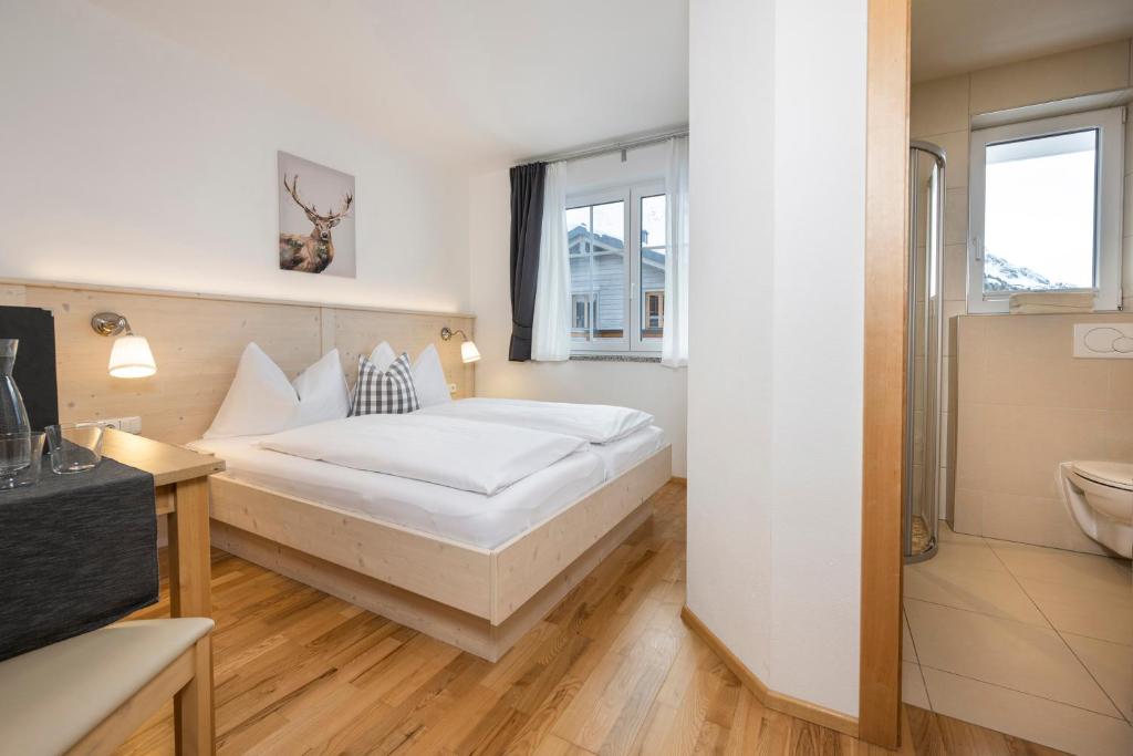 Postel nebo postele na pokoji v ubytování Appartement Haus Faßwald