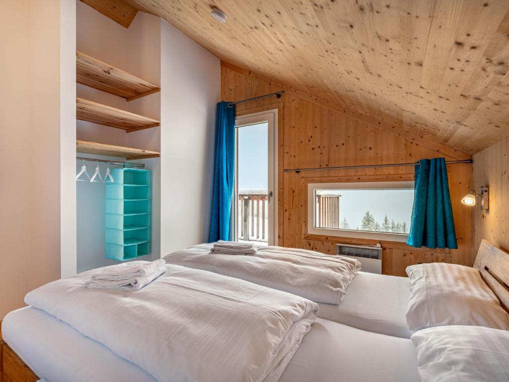 Postel nebo postele na pokoji v ubytování Chalet Klippitzoase by Interhome