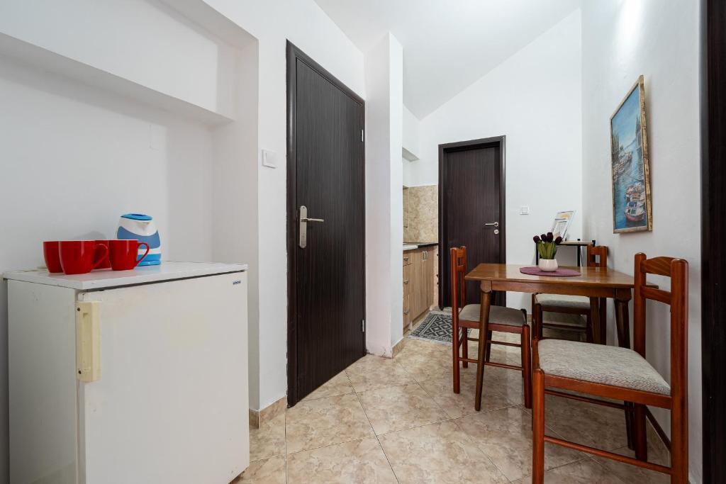 Kuchyň nebo kuchyňský kout v ubytování Garni Hotel S Coast