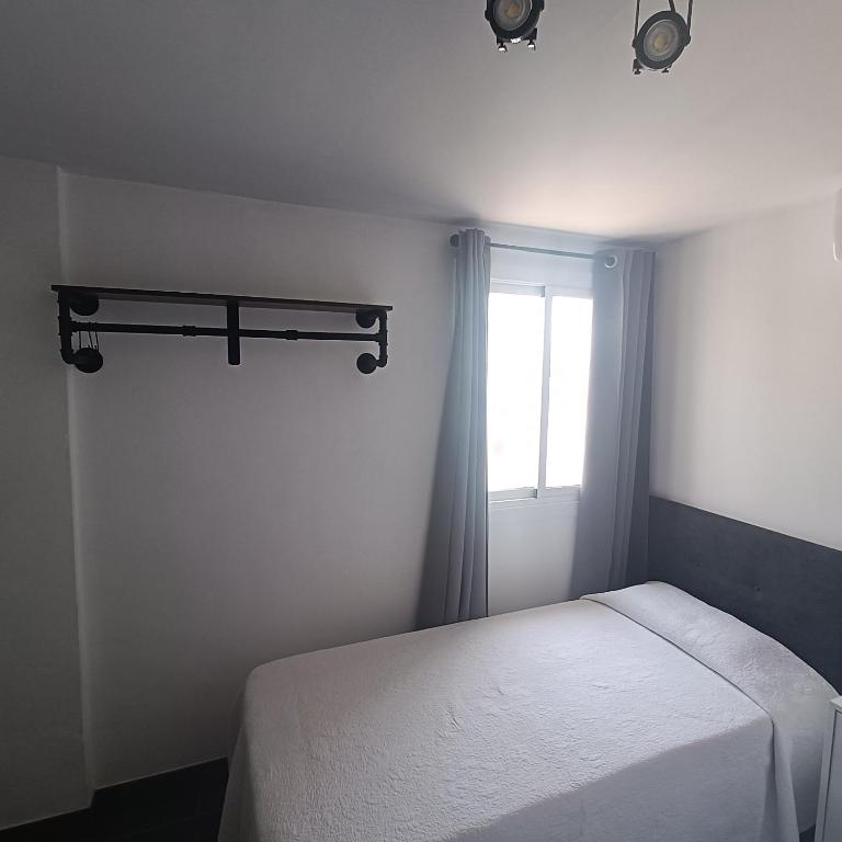 Posteľ alebo postele v izbe v ubytovaní Duquesa Harbour Club Aparthotel