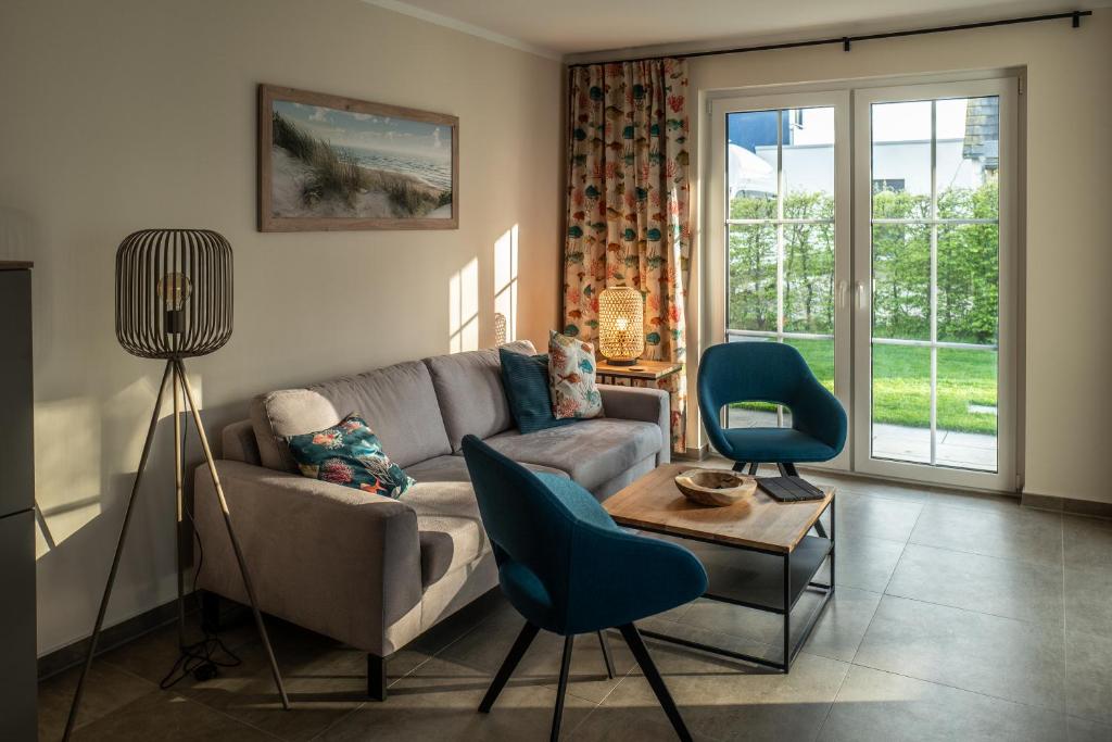 Posezení v ubytování Reetdachhaus Sternblick