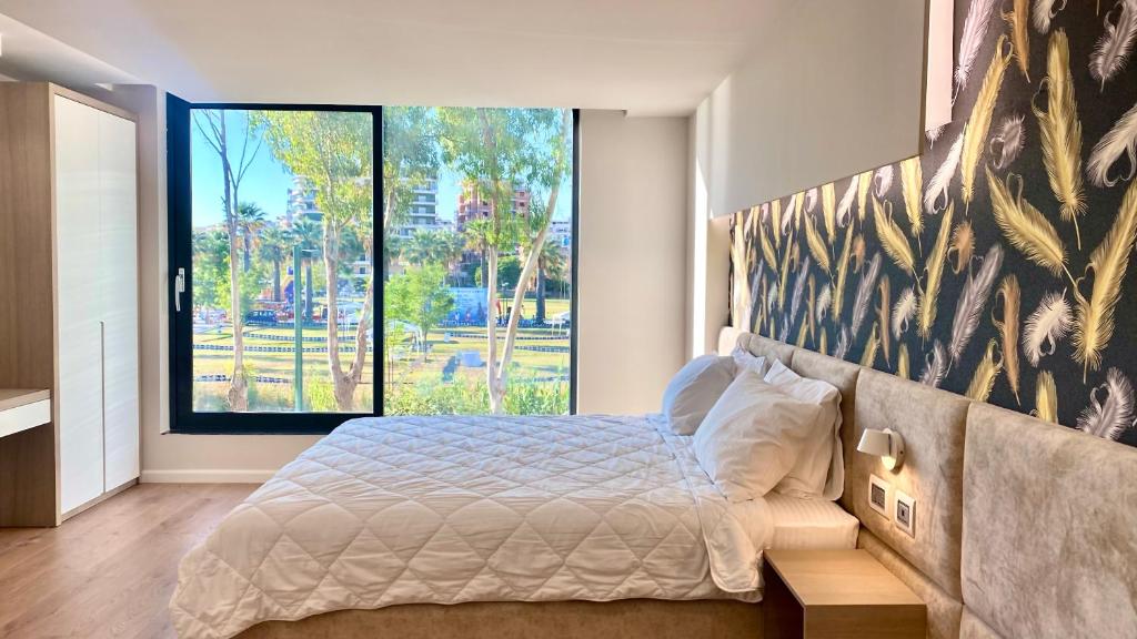 Postel nebo postele na pokoji v ubytování Marina Premium Hotel & Apartments