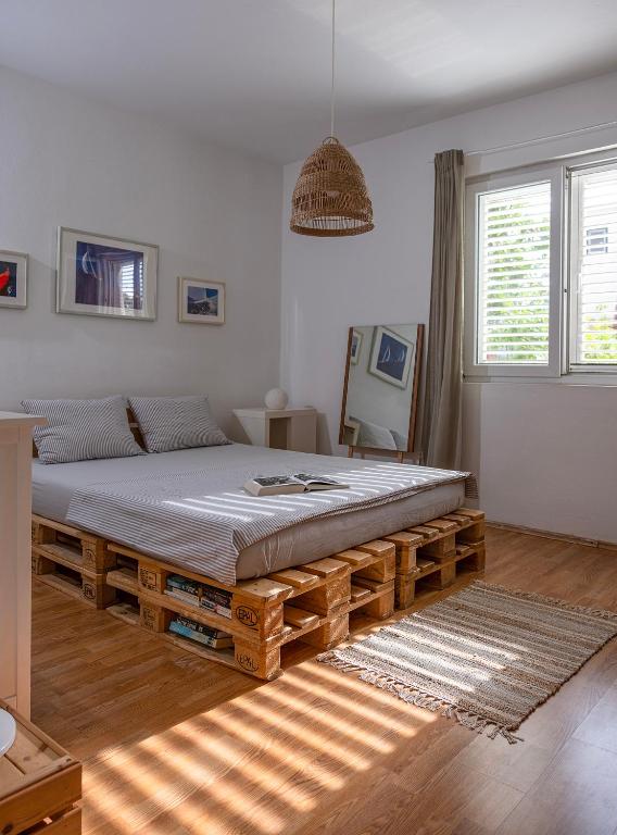 Postel nebo postele na pokoji v ubytování Apartment Sea View 1