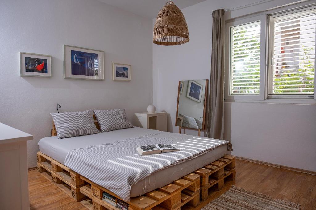 Postel nebo postele na pokoji v ubytování Apartment Sea View 1