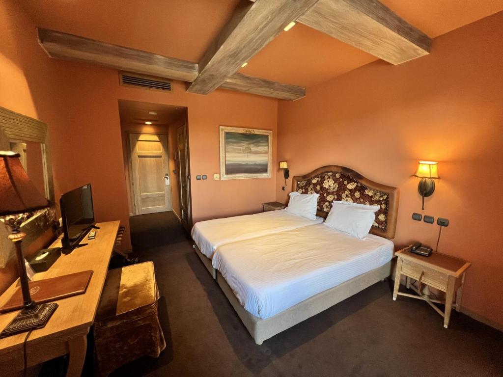 Posteľ alebo postele v izbe v ubytovaní Mainalon Resort