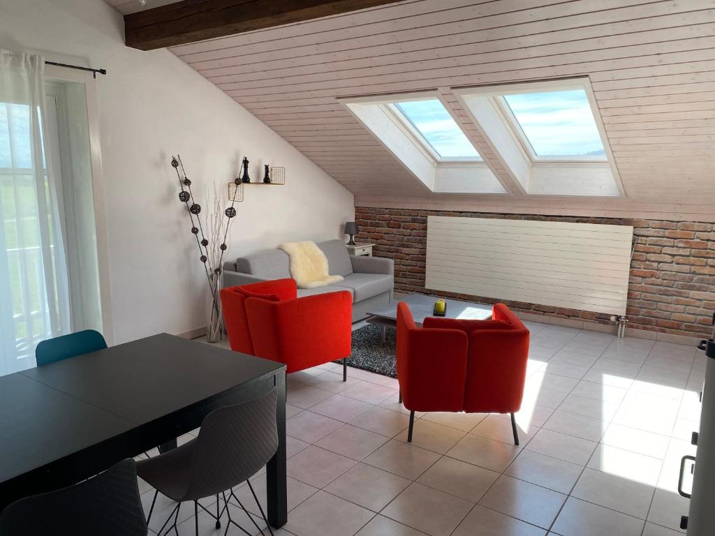 Posezení v ubytování Appart' dans maison familiale