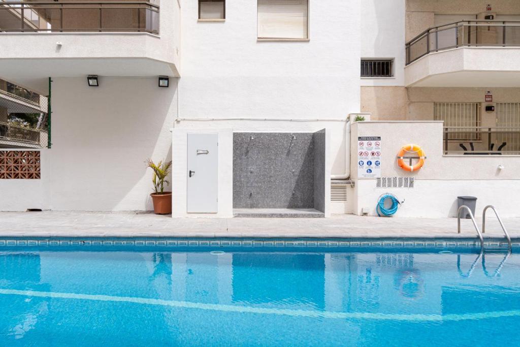 Bazén v ubytování TuristMar - Amplio Apartamento en Salou con piscina, a 2 minutos de la Playa nebo v jeho okolí