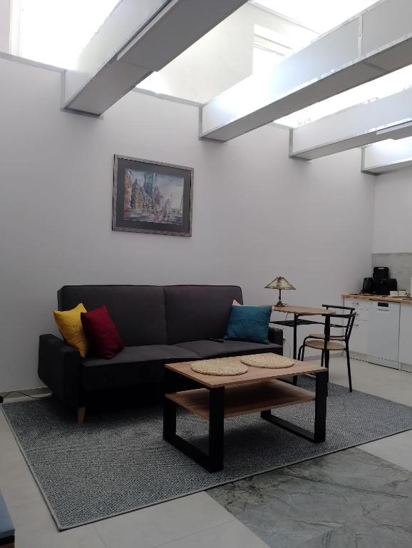 Posezení v ubytování Studio z aneksem kuchennym z 1 sypialnią