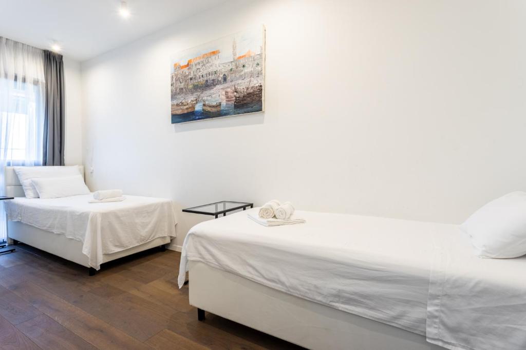 Posteľ alebo postele v izbe v ubytovaní Apartment Lola
